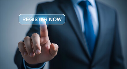 Businessman in dark suit and blue tie presses glowing digital button labeled register now on futuristic interface for online signup or access