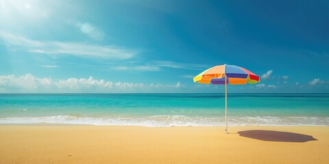 Beach umbrella against a water and sky backdrop on a summer beach, ideal for travel and outdoor themes, World Environment Day