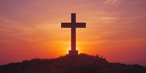 Solid concrete cross silhouette set against a colorful sunset background for spiritual reflection