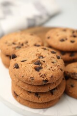 Delicious chocolate chip cookies on table, closeup