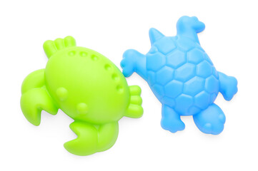 Bright children's beach toys isolated on white, top view