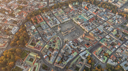 Aerial view of Krakow Old Town Square with St. Mary's Basilica and historic European architecture.