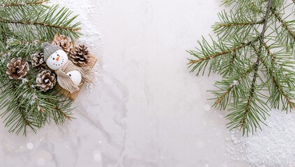 Cones and fir branch alongside a snowman with artificial snow, winter holiday scene