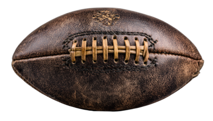 Vintage worn leather American football with stitched laces on black background