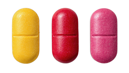Three oblong pills, yellow, red, and pink, side by side on a transparent background