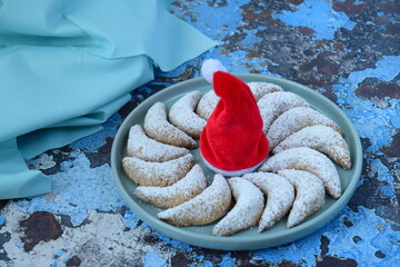 Vanillekipferl, traditional German Christmas cookies. Blue background