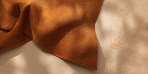 Fototapeta premium Natural leather with a tan suede finish, suitable for furniture upholstery or fashion accessories