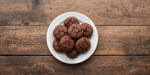 Chocolate cookies on a wooden table, homemade baking techniques