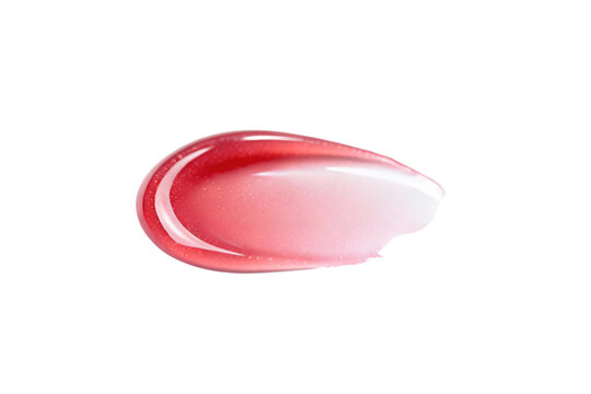 A close-up view of a glossy pink lip gloss swatch - Powered by Adobe