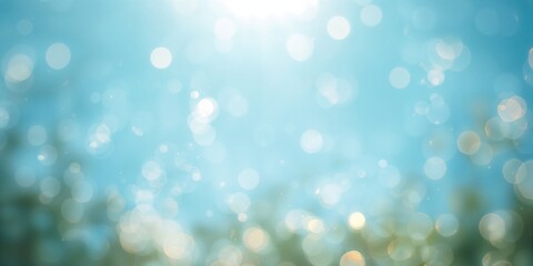 Obraz premium Blue sky with bokeh effect, diffused light creating an abstract texture ideal for artistic backgrounds