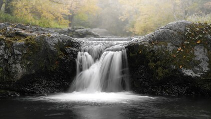 Fototapeta premium Abstract waterfall in monochrome, natural landscape with flowing water and forest elements, suitable for background use