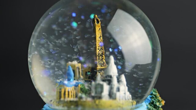 Snow globe with famous landmarks inside