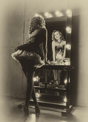 art sepia black and white color, happy retro lady long legs short dress stockings high heels back rear view looking into mirror. sexy woman smile face burlesque show, flapper girl 20s roaring twenties