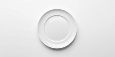 White plate on a white table seen from above, suitable for layout and text placement, World Food Day