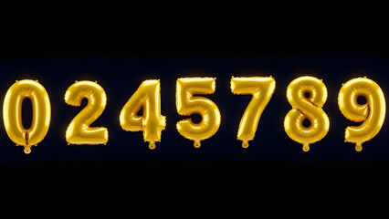 Golden mylar foil balloon numbers 0 2 4 5 7 8 9 floating on black background