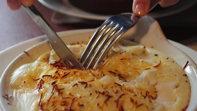 Canelones with spinach, cheese and bechamel sauce in an Italian restaurant. High quality 4k footage