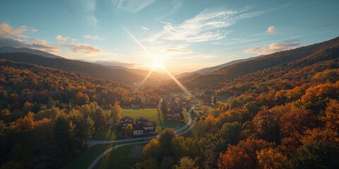 Drone shot of mountain village during autumn dawn, emphasizing seasonal transition and rural scenery