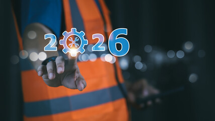 2026 new year engineering service concept with worker hand. Future mechanical maintenance setting and industry technology. Vision for construction repair solution and support.