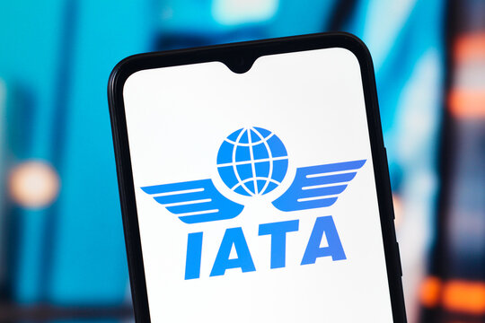 In this photo illustration, the IATA (International Air Transport Association) logo is seen displayed on a smartphone screen.