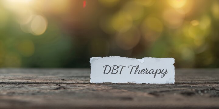 DBT therapy notes on paper focus on emotional regulation skills, supporting mental health management