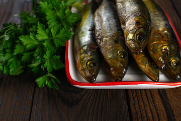 Fresh Smoked Fish with Parsley on Wooden Table: Rustic Culinary Photography