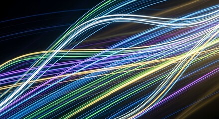 Abstract light trails dynamic lines of color on black background