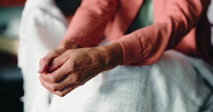 Person, hands and waiting with stress for loneliness, concern or ptsd for trauma in home. Closeup, afraid or thinking with nervous difficulty or emotion for mental health, anxiety or worry in house
