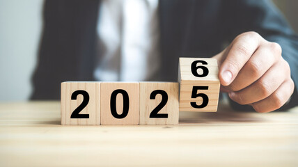 Changing year from 2025 to 2026 on wooden blocks