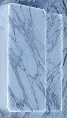 White marble surface with gray veins, illuminated by a glowing light stripe. Luxurious interior design element for sophisticated architectural background.