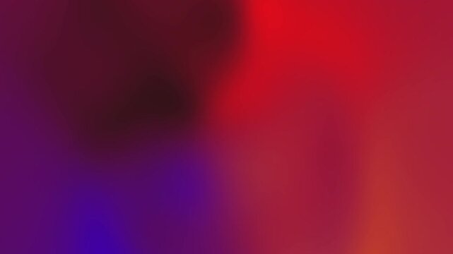 Soft abstract gradient of deep red, magenta, purple and cobalt blue blending into warm orange tones