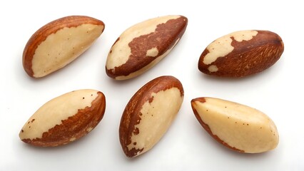 Obraz premium Six Brazil nuts isolated on white background with shadow. AI GENERATED.
