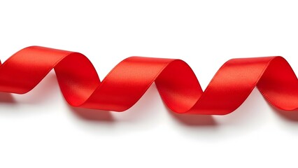 Vibrant red ribbon curl isolated on white background with subtle shadows