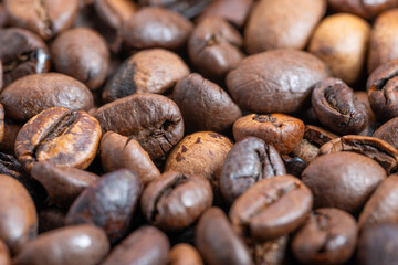 Coffee beans macro, Highcontrast detailed macro image of roasted coffee beans, Photograph capturing rich aroma and craftsmanship of small batch roasted coffee beans