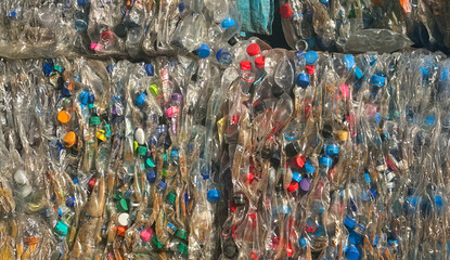 Plastic water bottles have been baled for recycling