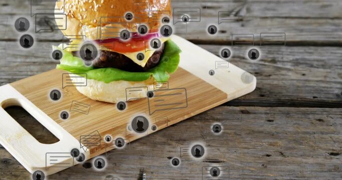 Floating chat icons initiating reveal, sesame burger rising and centering on board promoting burger