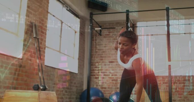 Woman starting bent over barbell doing rotating reaches, warming up with fitness charts tracking