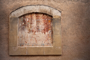 Stone and painted plaster surface