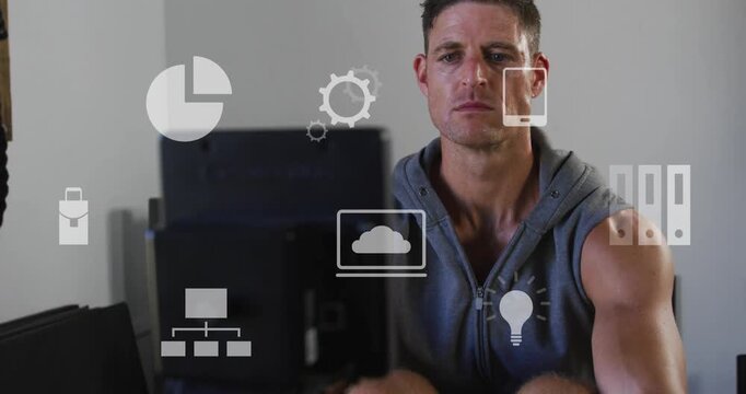 Man sitting on rowing machine doing strokes pulling handle UI icons over scene showing fitness data