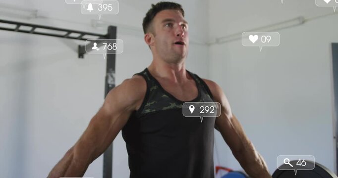 Male athlete bracing core, driving legs, powering red-bar lift, social icons rising for training