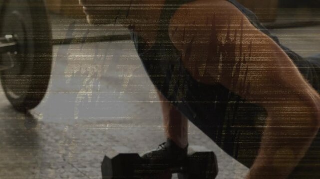 Man reaching for hex DBs doing pushups on mat, camera shifting with scanlines, training for fitness