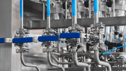 Food production machine with stainless steel pipes, cooling radiator as separator and tanks, valves and measuring instruments