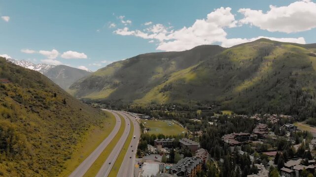 Vail city center and surrounding mountains, Colorado. Aerial view from drone in summer season