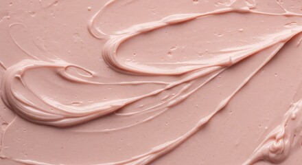 Smooth pink cream swirls on a soft pink background with subtle texture and gentle lighting