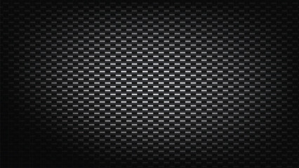 Naklejka premium Dark carbon fiber texture background with subtle spotlight effect