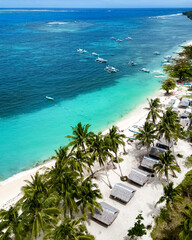 Daku Island, Siargao, Philippines. Tropical beach with palm trees