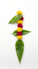 A vertical arrangement featuring yellow and magenta flowers interspersed with green leaves against a plain white backdrop