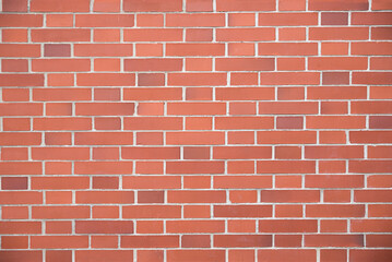 red brick wall with rectangular blocks. architectural background