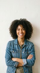 Fototapeta premium Woman Smiling Against Wall 2025 11 23 - A confident woman smiles against a wall, symbolizing positivity, strength, assurance, authenticity, and approachability