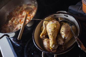 Cooking chicken and rice on the stove