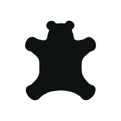 A simple black silhouette of a teddy bear shape on white background